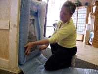 A massive speaker : mailroom, freight, next  day, early am